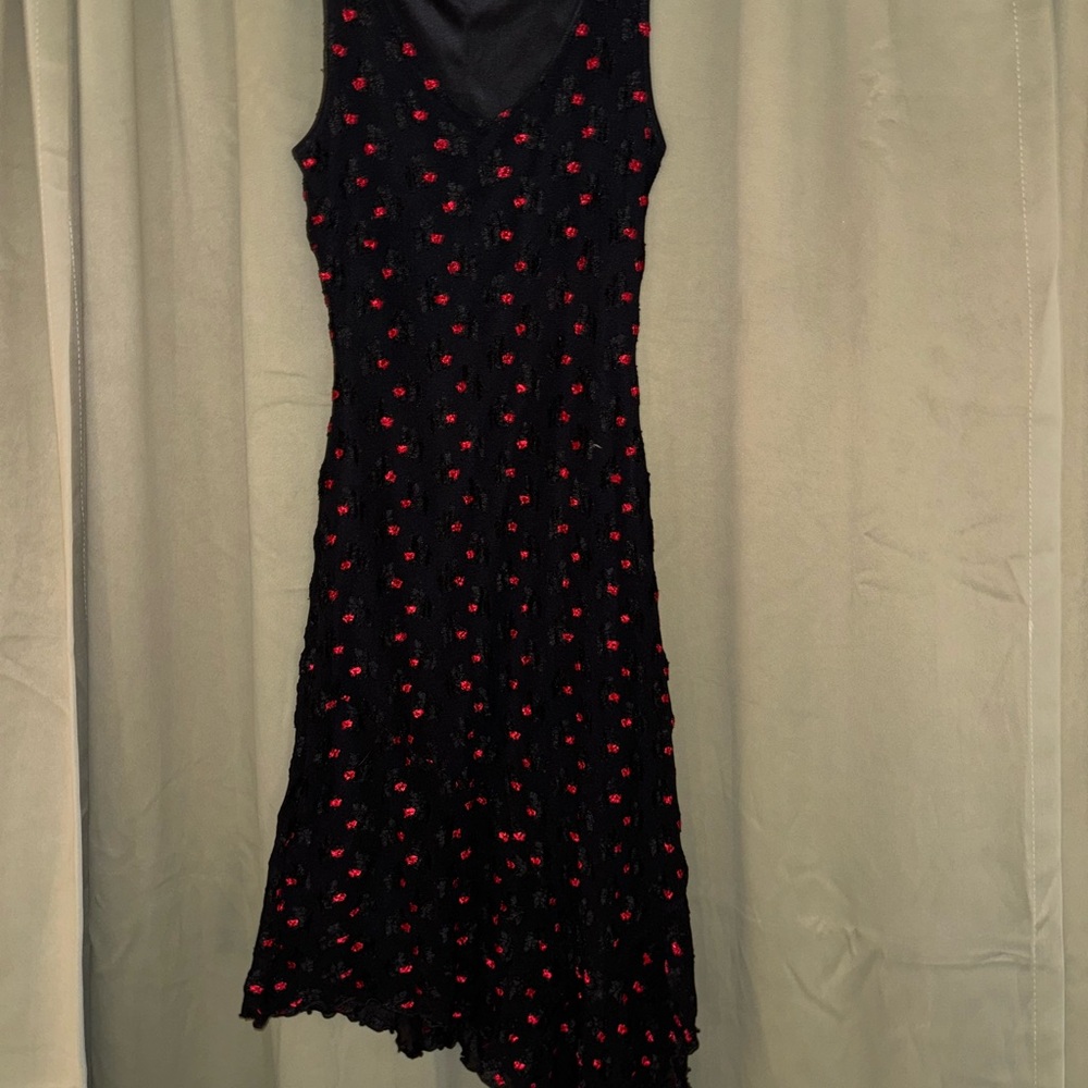 Elegant Black Dress with Red Floral Accents